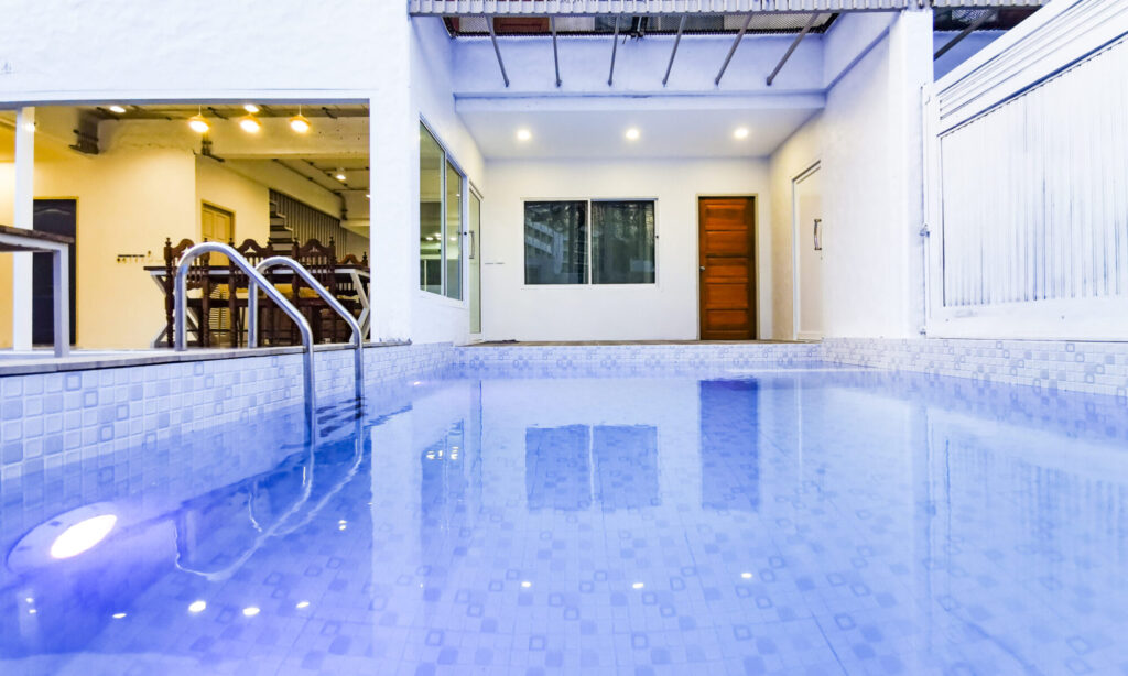 Private swimming pool at Thepprasit Cosy Twin crystal-clear water, modern design, and year-round tranquility just steps from your room.