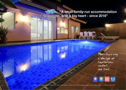 Relaxing poolside area at Thepprasit Cosy family‑run accommodation